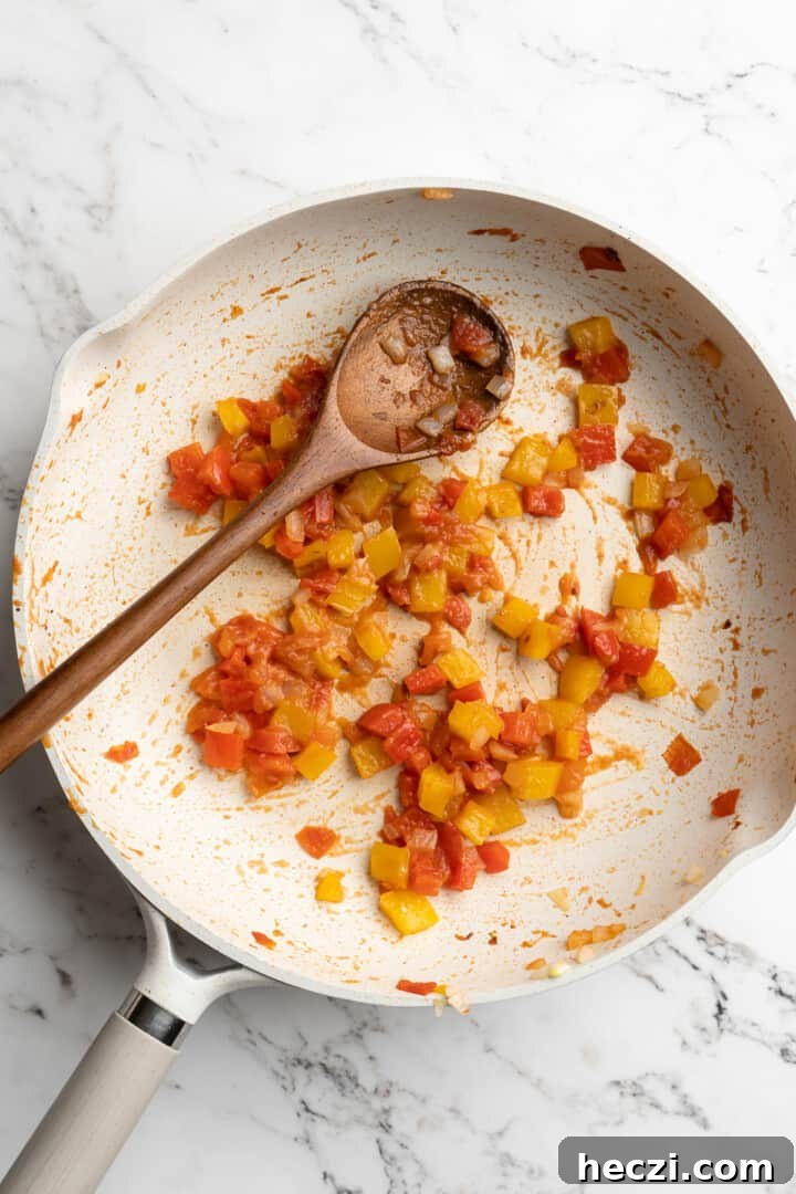 Sauté the vegetables. Overhead view of cooked vegetables in skillet