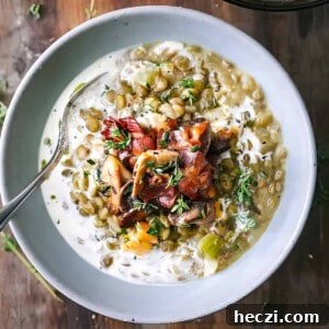 Creamy lentils with bacon and thyme in a bowl.