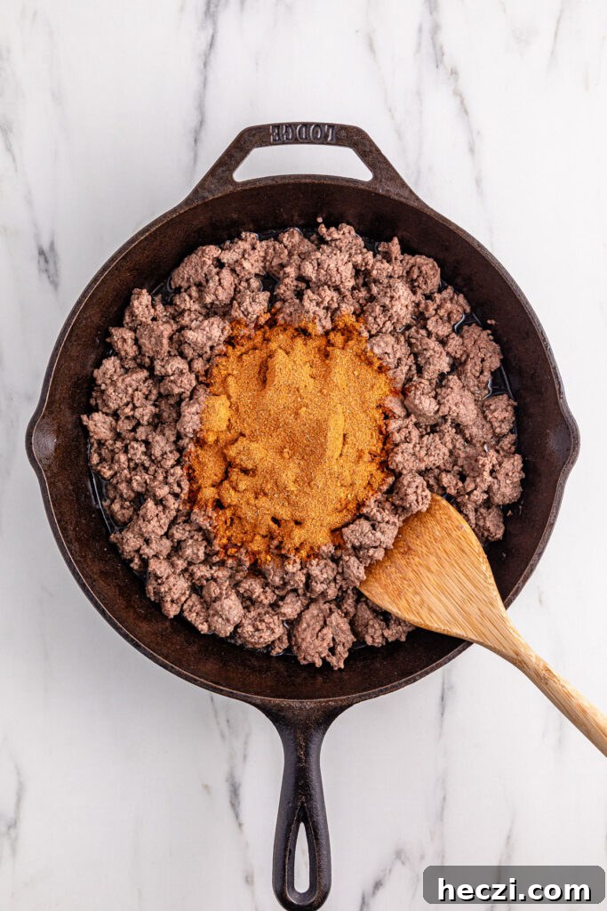 making taco meat in large skillet