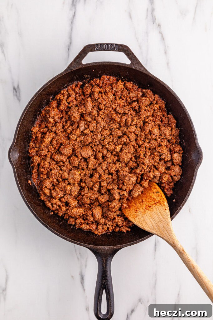 taco meat in skillet for Doritos taco salad