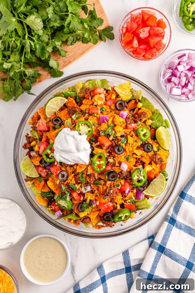 glass bowl of Doritos taco salad