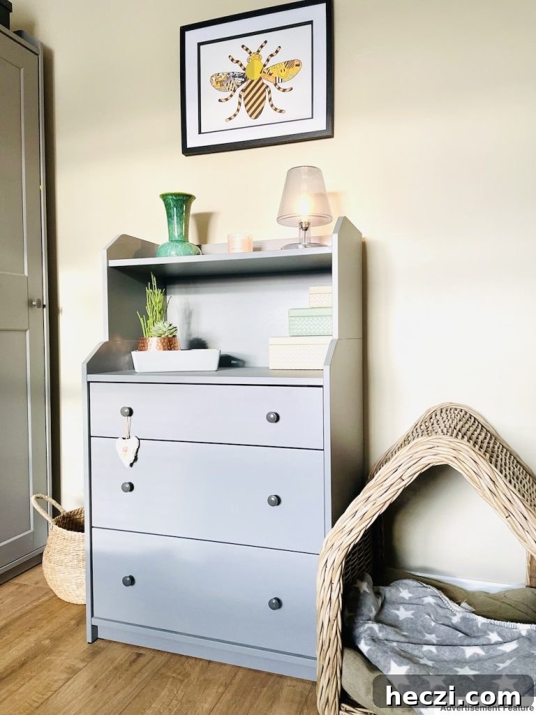 cupboard with nesting storage boxes and a storage tray with a plant