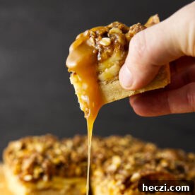 Chewy Apple Crisp Bars with Cinnamon Streusel 14 Drizzle of caramel sauce over square of apple crisp bar