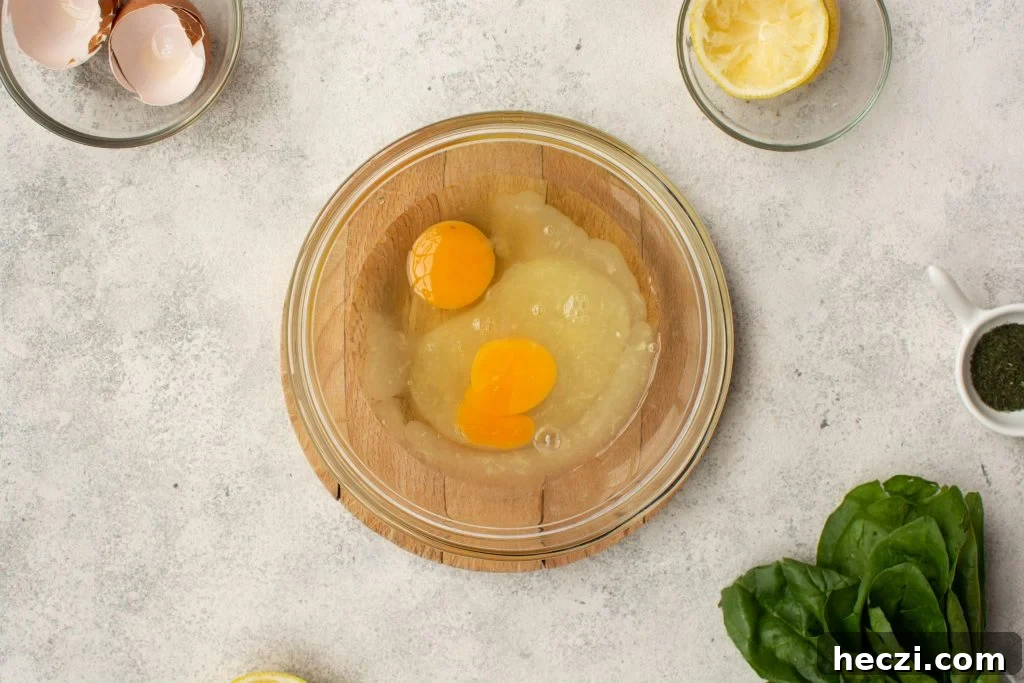 two eggs in a glass bowl