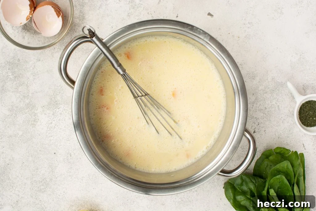 creamy lemon chicken soup after tempering in eggs