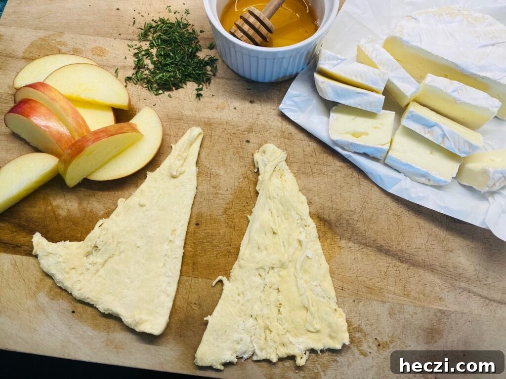 Crispy Apple and Brie Roll-Ups with Honey Dijon Dip 3 setting up the station to make the roll ups