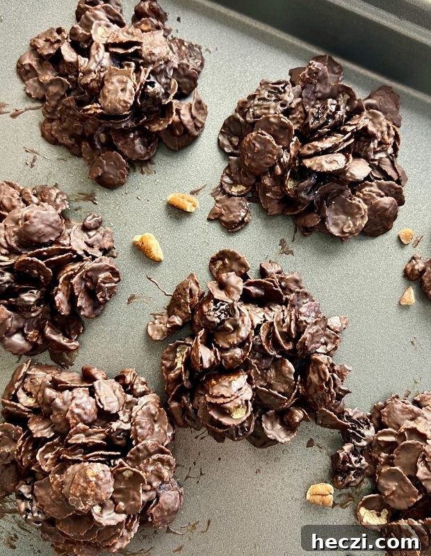 Longevity Kitchen: Dark Chocolate Secrets with Liz Weiss, RDN (Podcast Ep. 115) 3 Dark chocolate, pecan, and tart cherry clusters via lizshealthytable.com