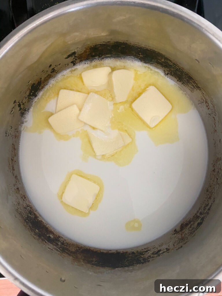 Combine milk, water, sugar, salt and butter in a medium pot