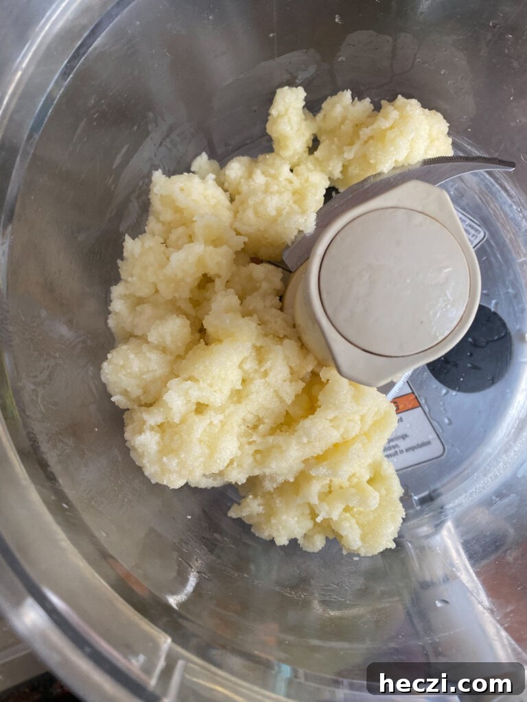 Transfer your flour panade to your food processor and pulls 4-5 times. Take off the lid of your food processor and allow it to cool for 5 minutes. The pulsing allows the steam and heat to evacuate.