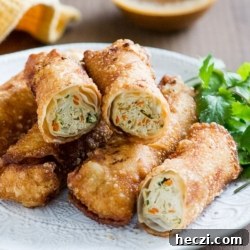 Crispy Chicken and Veggie Egg Rolls with Hoisin Peanut Dip 2 Easy Chicken Vegetable Egg Rolls Recipe that everyone will love