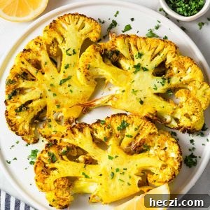 air fryer cauliflower steaks with parsley and lemon.