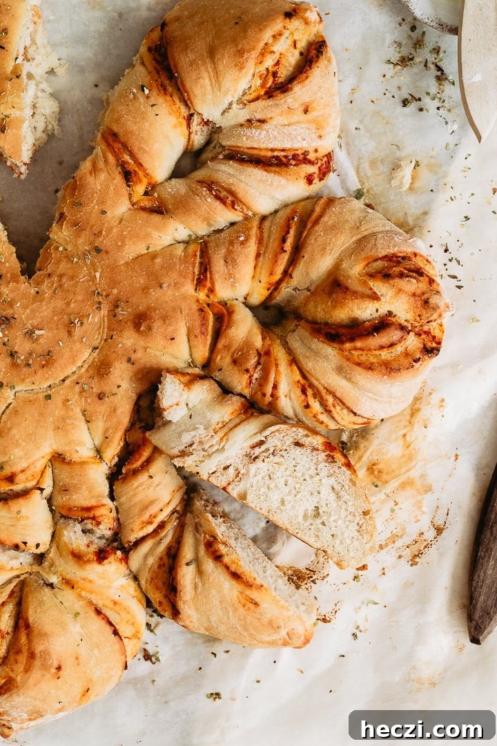 Fluffy quick pizza star bread with tomato, oregano and mozzarella