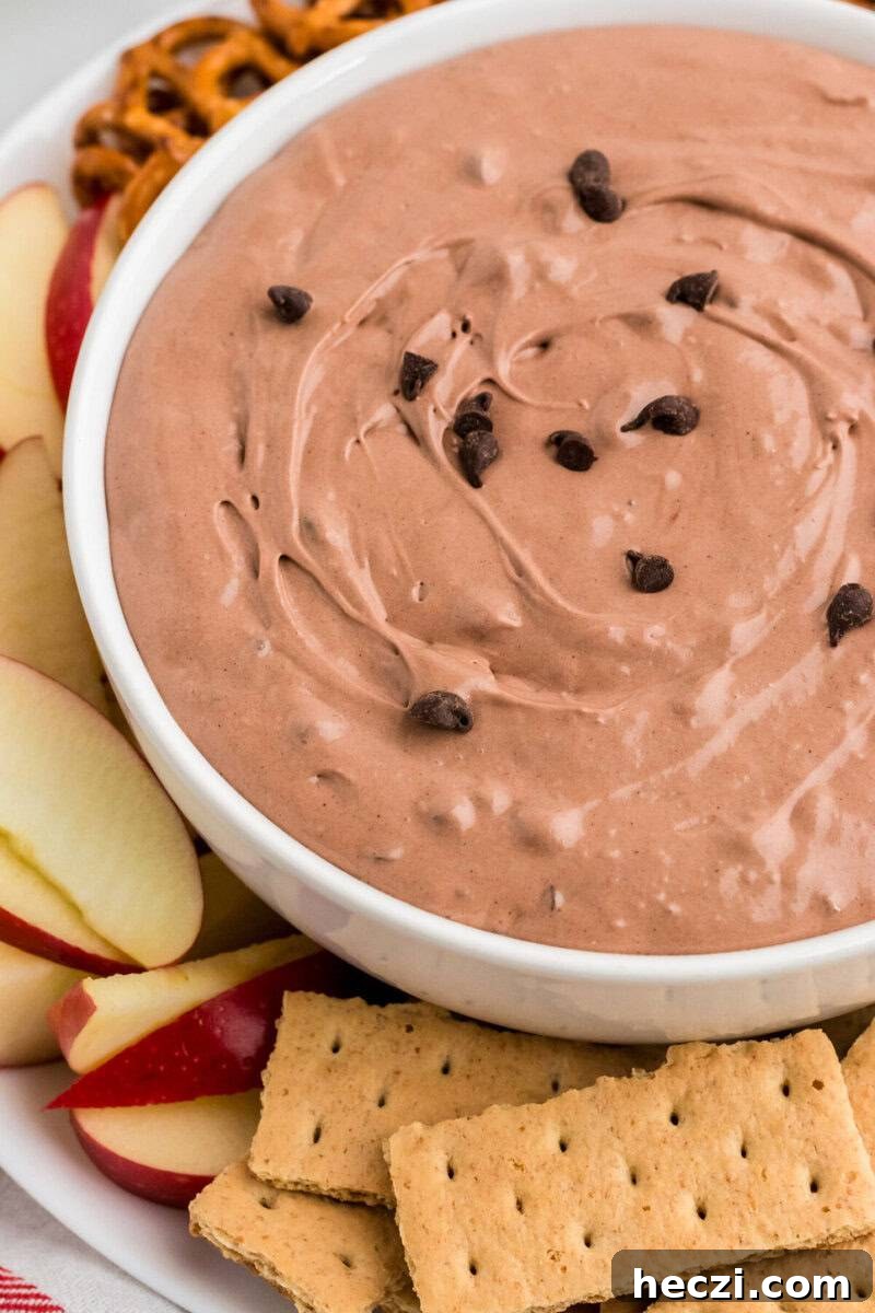 closeup of the Brownie Batter Dip served in a white bowl.