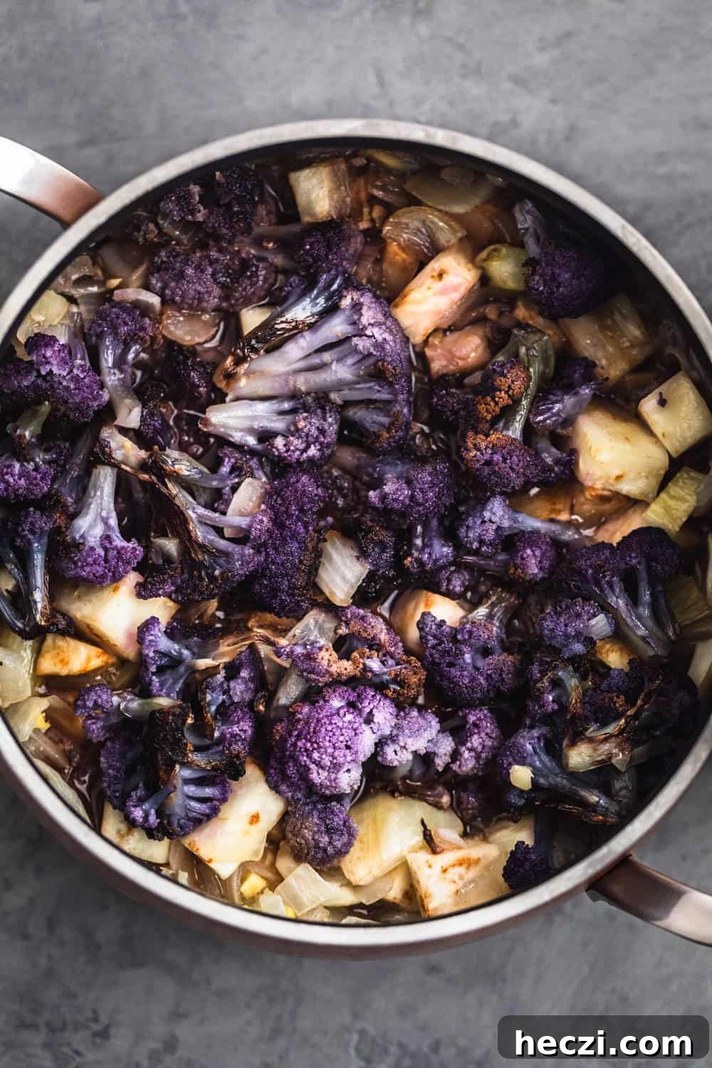 Ingredients in soup pot have been simmered in veggie stock.