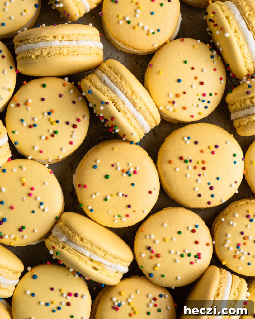 Yellow Macarons with rainbow sprinkles: How to make macarons; a guide to perfect macarons every time