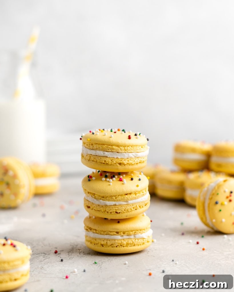 Yellow Macarons with rainbow sprinkles: How to make macarons; a guide to perfect macarons every time