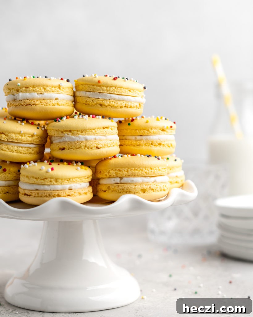 Yellow Macarons with rainbow sprinkles: How to make macarons; a guide to perfect macarons every time