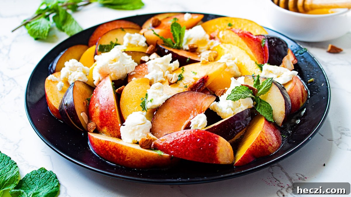 Stone Fruit Salad with Goat Cheese and Honey-Lemon Vinaigrette Recipe 3 stone fruit salad on a plate