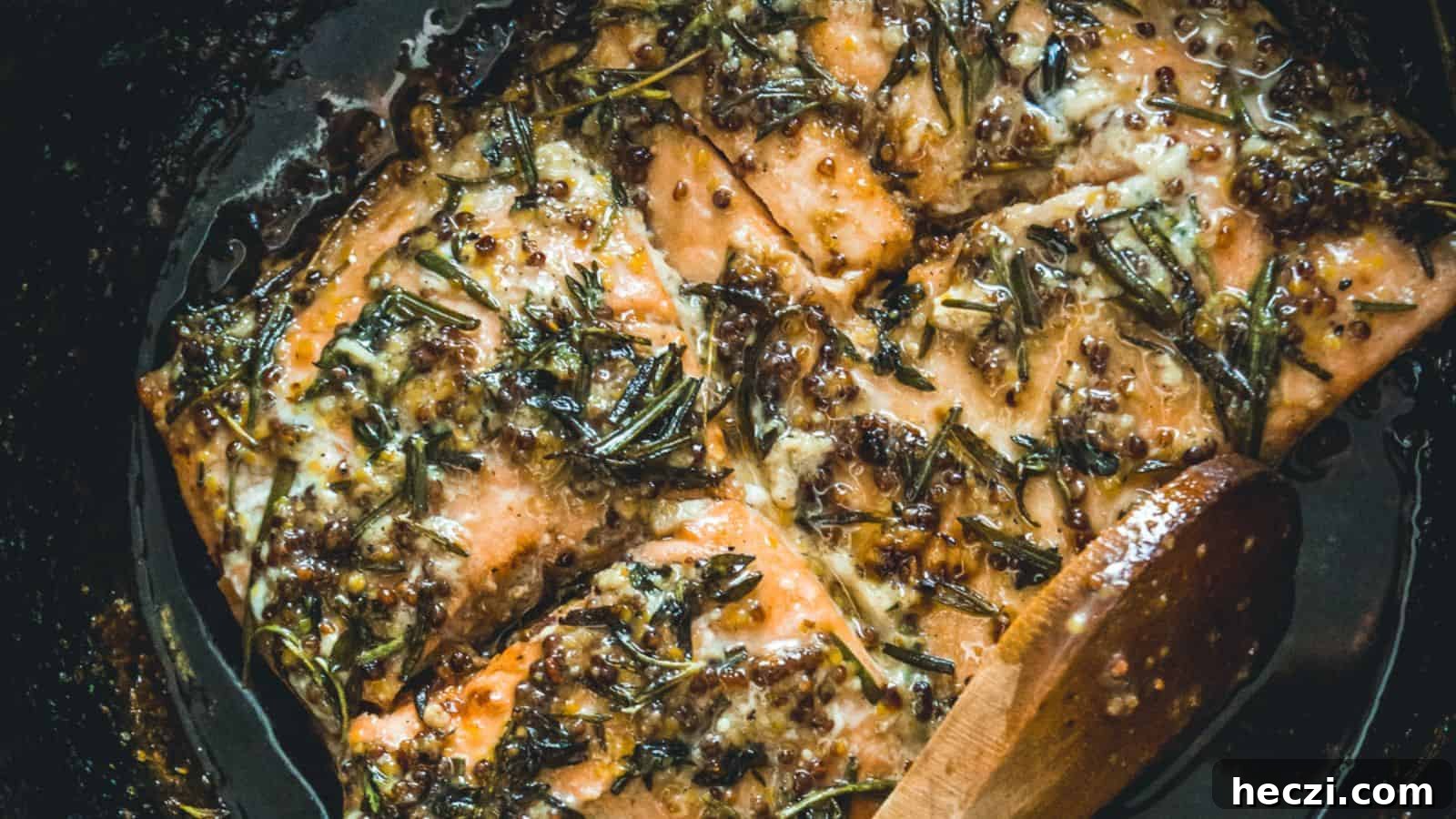 Overhead view of sockeye salmon in cast iron pan.