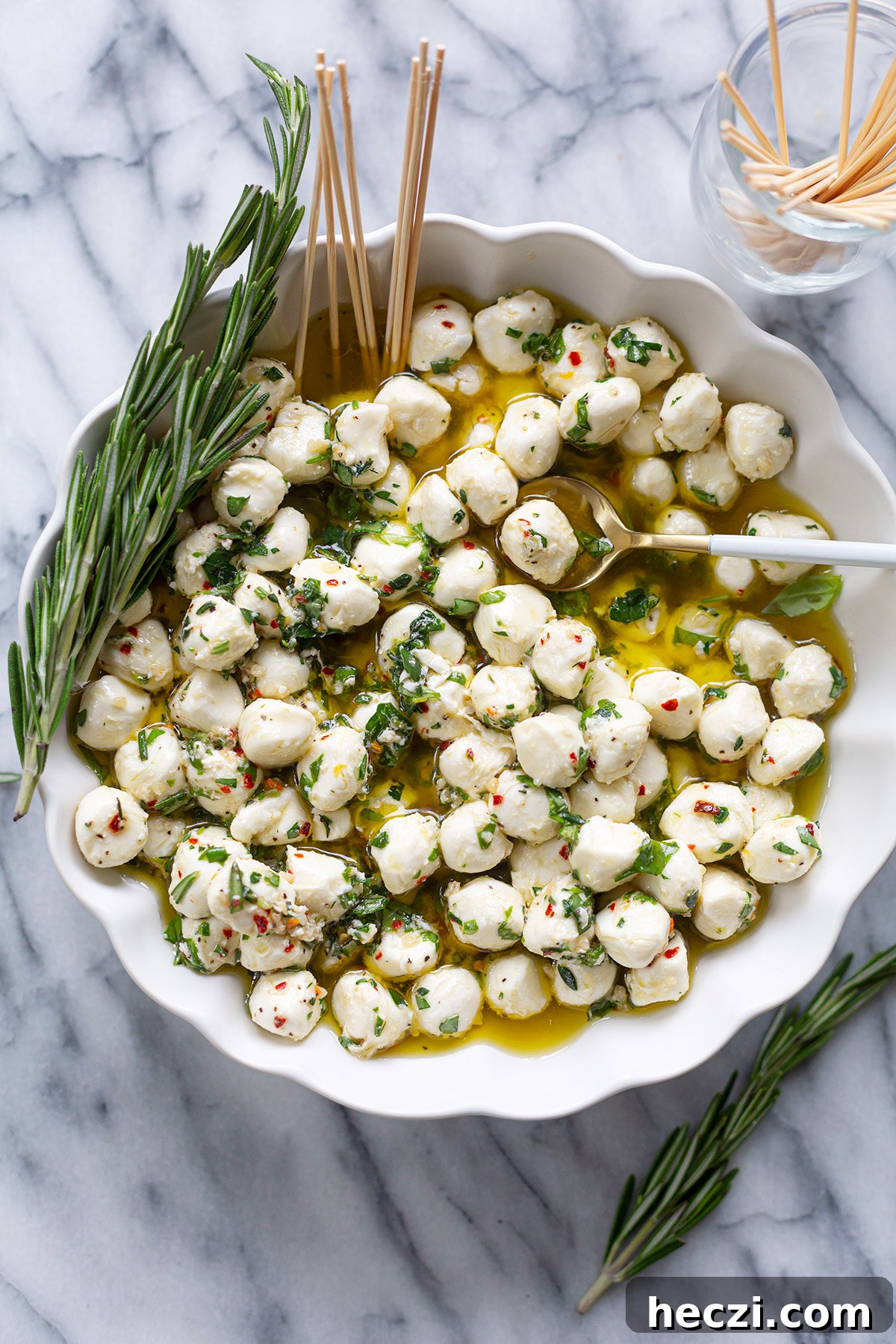 Marinated Mozzarella Balls with Herbs and Garlic 4 herb marinated mozzarella balls with olive oil