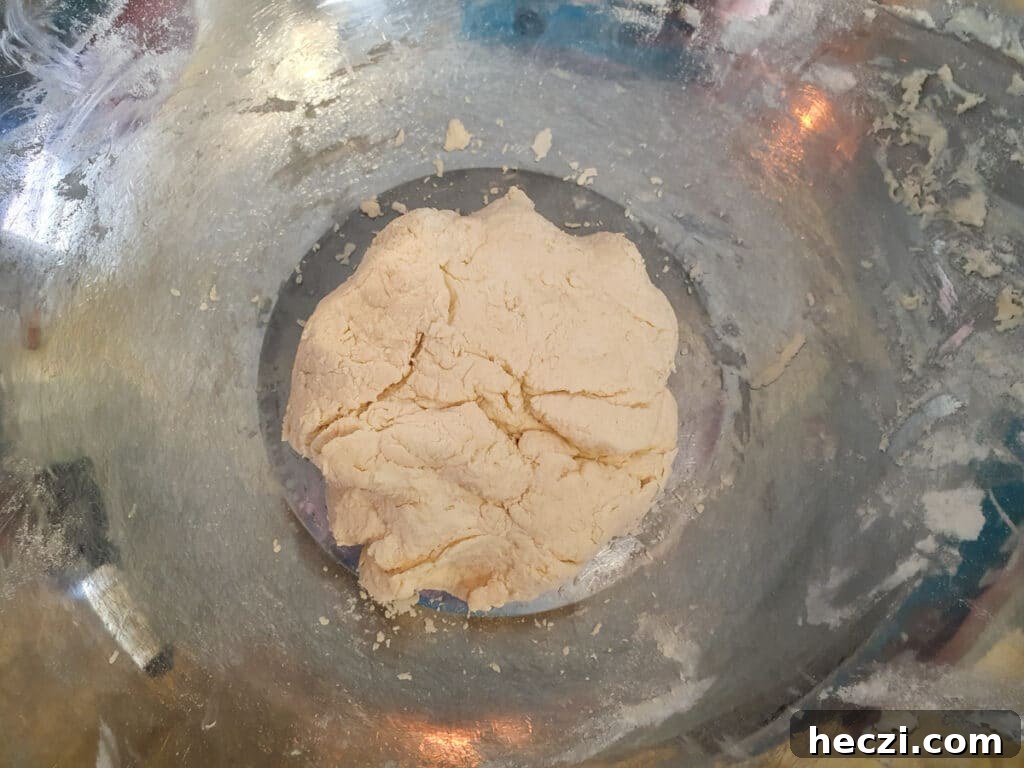 Air Fryer Cinnamon Rolls: Quick, Fluffy Homemade Recipe 5 Mixed in dough ready to roll.