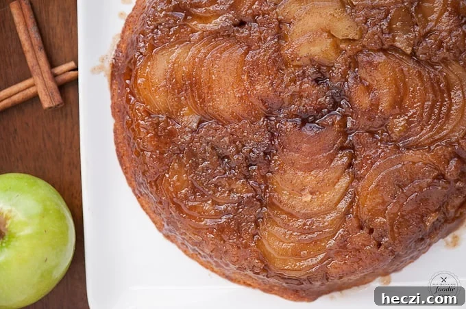 Caramel Apple Upside-Down Cake Recipe for Fall Gatherings 4 top of a homemade apple upside down cake