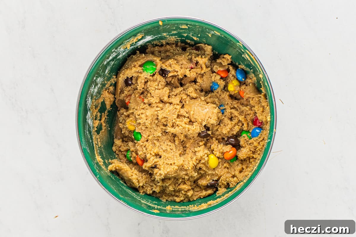 M&M blondie dough in a mixing bowl.