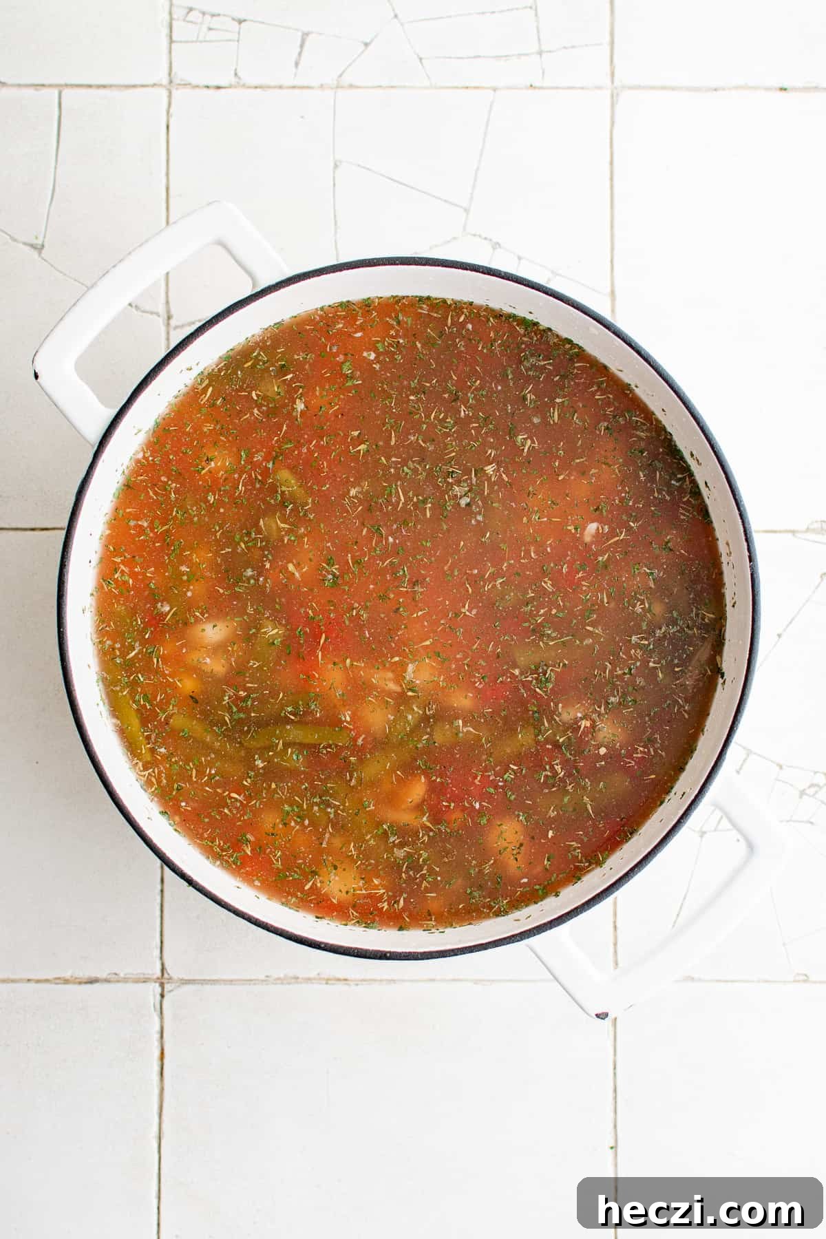 Pan of soup ready to be cooked.