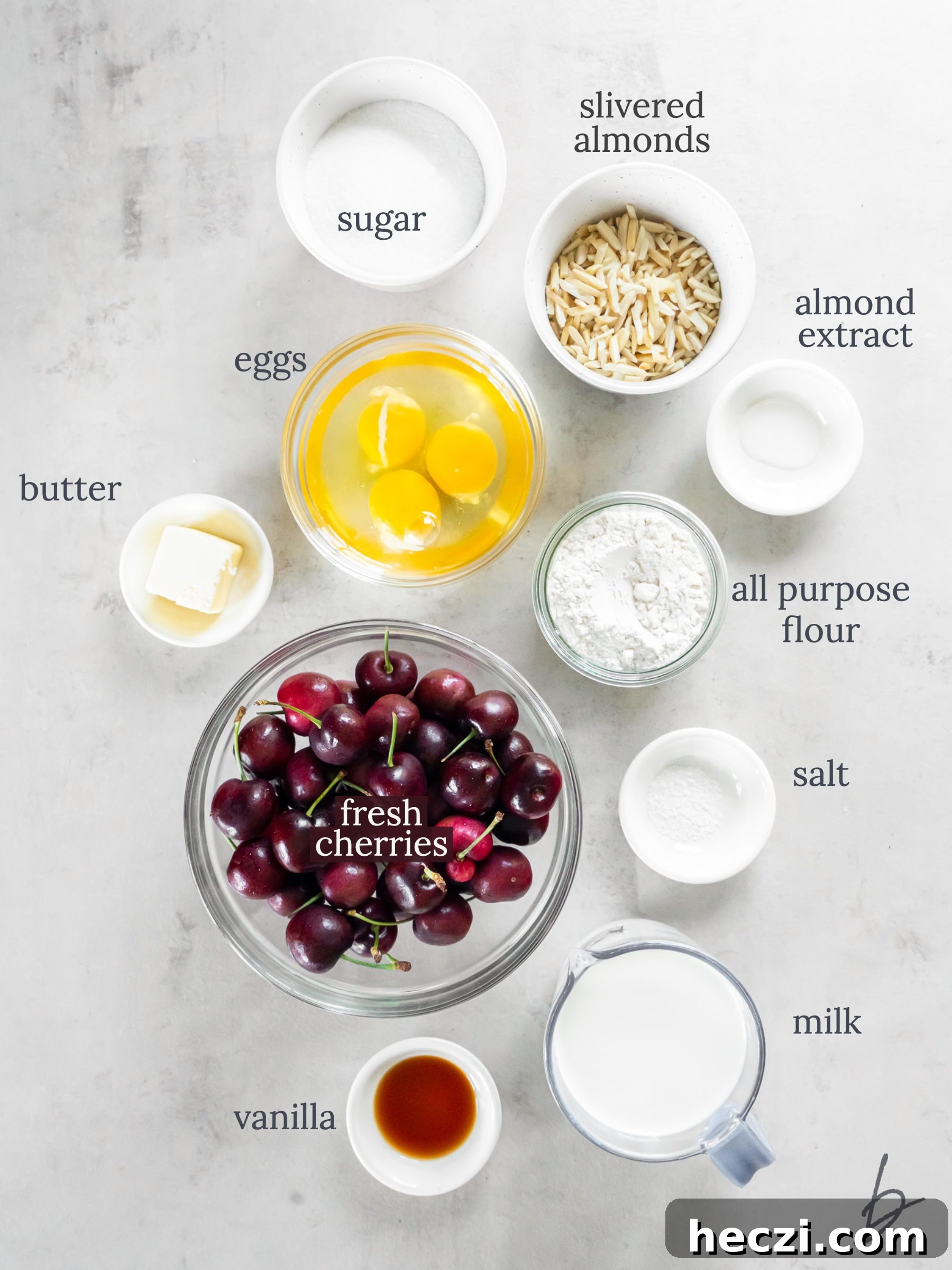 bowls of ingredients to make cherry clafoutis.