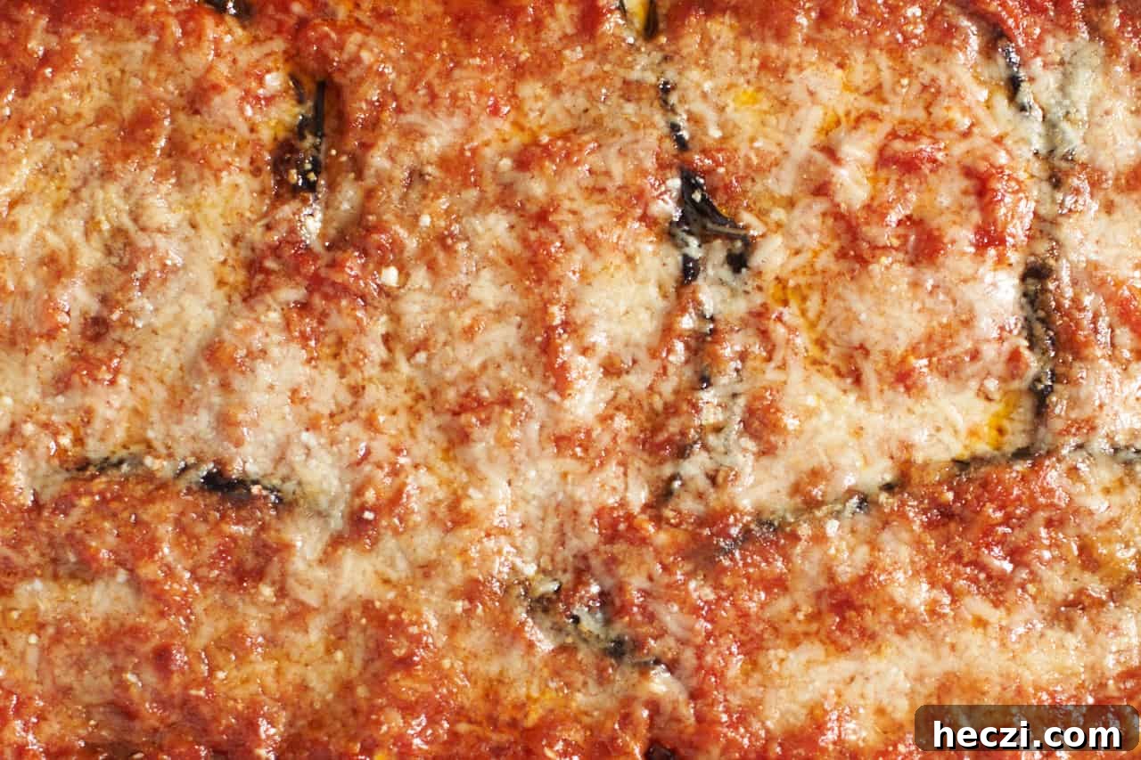 Melted cheese on top of vegetarian eggplant lasagna.