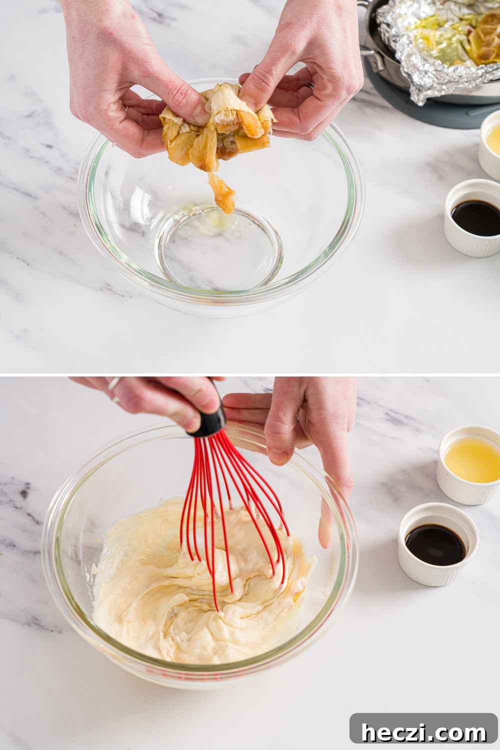 Two photos of garlic aioli being made in a glass bowl. The first photo shows roasted garlic being squeezed into a glass bowl. The second photo shows a whisk mixing additional aioli ingredients including mayo and lemon juice.