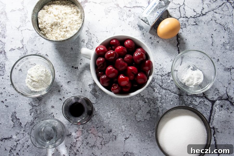 bowl of cherries, an egg, butter, flour, sugar, and red wine